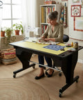 Smooth Electric Height Adjusting Sewing Table With Remote Control And Tilt Top Setup Rock Solid For Standing Or Sit Down Crafters Includes Large Cutting Mat And No Sweat Motorized Lift In Classic Black used for sewing.