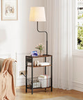Floor Lamp With Integrated Table And Storage Baskets End Table With Three Color Temperature LED Bulbs Nightstand With USB Charging Station And Shelves Side Table For Living Room Bedroom Or Office Brown placed beside sofa in living room.