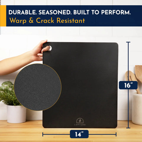 Person holding 14x16 Inch Pizza Steel Pro Grade Heavy Duty Carbon Steel Baking Plate For Oven And Grill showing size and texture.