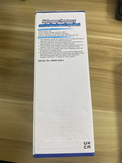 Side view of Upgraded Ultrasonic Pest Repeller 6 Pack Indoor Plug In With Three Frequency Modes packaging on wooden surface