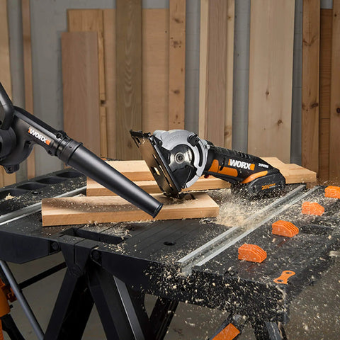 20V Cordless Shop Blower With Power Share, Tool Only, 160 MPH Air Velocity on workbench clearing dust and debris