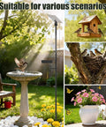 Heavy Duty Ground Stake Mount Bracket For Outdoor Security Cameras And Solar Panels shown in a vibrant garden setting.