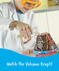 Child playing with Beaker Creatures Bubbling Volcano Reactor Science Kit for Kids Ages 5 and Up with Five Fizzing Experiments.