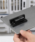 Detachable Cabinet Door Hinge With Integrated Lock Zinc Alloy Black Barrel Style on steel panel, showcasing wear resistance.