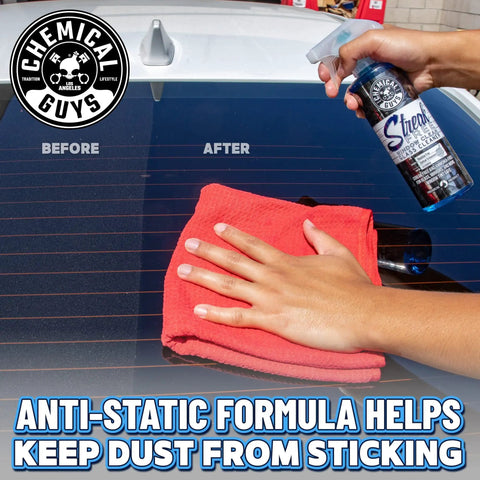 Hand using Streak Free Glass And Window Cleaner For Tinted Windows Ammonia Free Safe On Factory And Aftermarket Tint 16 Oz