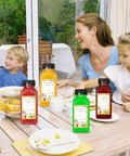 A family enjoying breakfast outdoors with 30 Pack 8oz Clear Plastic Bottles With Leak Proof Caps For Juices Smoothies Milk And Other Drinks Food Grade PET Recyclable Bulk Containers Perfect For Homemade Beverages on the table.