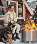 Woman and dog near Smokeless 28 Inch Fire Pit With Stand And Grill Rack For Backyard Fun Large Stainless Steel Wood Burning Outdoor Stove