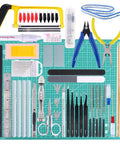 Must-Have 87-Piece Model Tool Kit For Gunpla And Hobby Building Pro Grade Craft Set displayed with tools on a green cutting pad.
