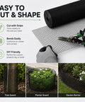 Premium Quality 1/2 Inch Black Hardware Cloth 48 Inches Wide By 100 Feet Long Roll shown being cut with snips for DIY projects.