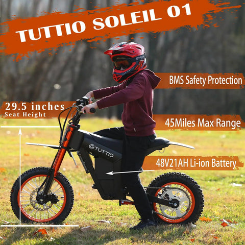 Rider on electric dirt bike for teens and adults with 3000W peak mid drive motor in a forest setting.