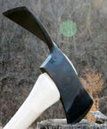 Pulaski Wildfire Axe With 3.75 Lb Head And 36 Inch Hickory Handle, resting on tree stump, outdoors, made in the USA