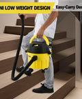 Person carrying 3 In 1 Wet Dry Vacuum Cleaner With 2 Peak HP Suction Portable Shop Vacuum for garage and car on stairs