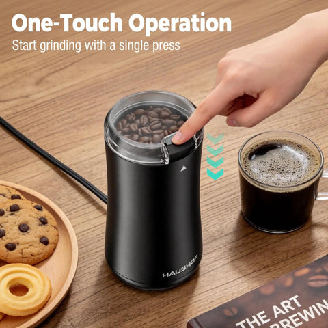 One Touch Electric Coffee Grinder For Beans, Spices, Herbs And Seeds in use with finger pressing button next to coffee cup.