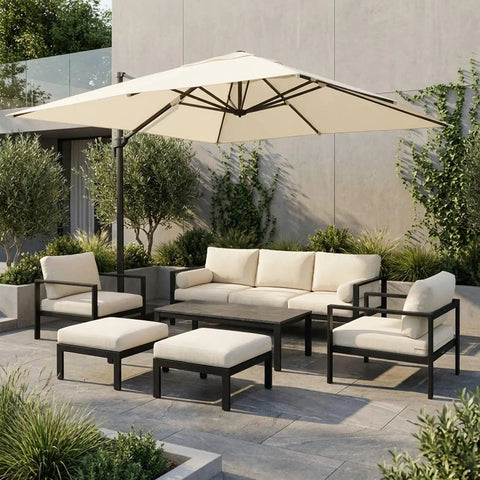 Outdoor patio set with beige cushions and black frame, shaded by a white umbrella, featuring Wicker Furniture Clips 4 Pack For Outdoor Patio.
