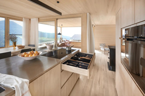 21 Inch Undermount Drawer Slides With Soft Close Action, full extension cabinet runners in a stylish kitchen with wooden drawers.