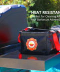Collapsible Water Bucket For Grill Cleanup And Outdoor Adventures, ultra durable bucket on grill station with red handles and logo.