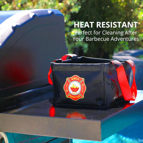 Collapsible Water Bucket For Grill Cleanup And Outdoor Adventures, ultra durable bucket on grill station with red handles and logo.