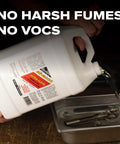 One Gallon Professional Workhorse Ultrasonic Cleaner Fluid Nukes Stubborn Cosmoline Carbon Buildup And Heavy Grease Residue Quickly Wiping Dirtiest Metal Parts Spotless being poured into a cleaning tank.