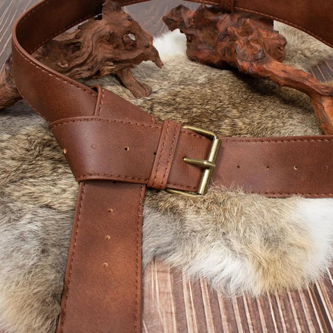 Dual Brown Renaissance Belt Pouch And Viking Bracer Kit Featuring detachable brown leather belt with brass buckle on fur background.