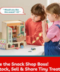 Two kids playing with Wooden Vending Machine Play Set For Kids Built For Realistic Pretend Shopping Fun With Snack Bars And Drink Cans