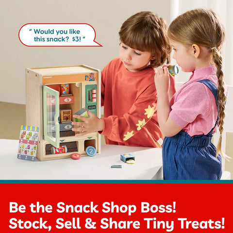 Two kids playing with Wooden Vending Machine Play Set For Kids Built For Realistic Pretend Shopping Fun With Snack Bars And Drink Cans