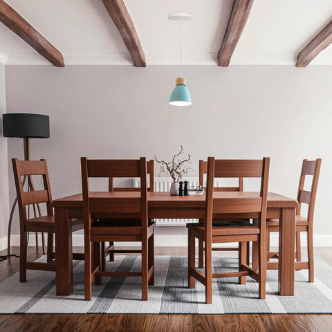 Kiven Instant Light Conversion Kit for 4/5/6inch Hole over a wood dining table in modern farmhouse setting with blue pendant.