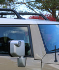 Short Rubber Antenna For Toyota FJ Cruiser 2007 2015 Fits USA Stainless Steel Threading Six Point Three Four Inch Slick Low Profile Easy Install Car Wash Proof Internal Copper Coil Accessory installed on vehicle.