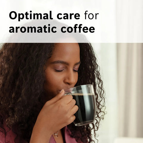 Woman enjoying coffee, promoting Descaling Tablets For VeroCafe Espresso Machines Easy 2 In 1 Descaler And Cleaner That Kicks Limescale And Corrosion