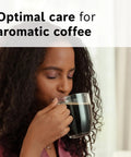 Person enjoying coffee with VeroCafe Espresso Cleaning Tablets 2 In 1 Phosphate Free Formula Removes Coffee Oil And Residue