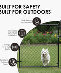 Chain link fence gate with a lock-ready latch, reversible installation, swings easily, rust-resistant finish in garden setting.