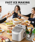 No Sweat Countertop Ice Maker With Rapid Six Minute Freezing And Daily Twenty Six Pound Output on dining table with food and drinks.