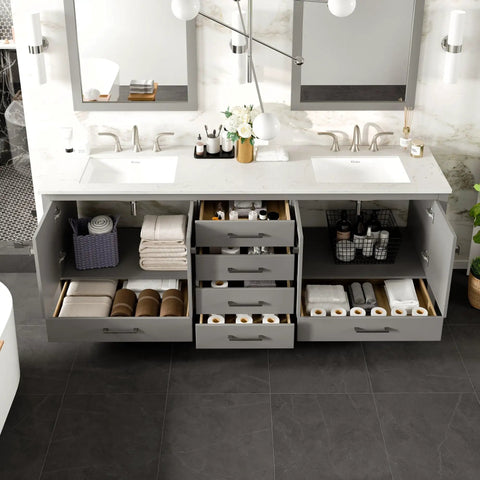 84 Inch Gray Double Sink Bathroom Vanity featuring storage drawers and a white Carrara top, showcasing organized towels and accessories.