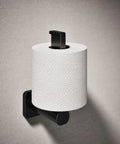 Parallel Vertical Toilet Paper Holder For Easy Access And Clean Lines in Matte Black finish mounted on bathroom wall