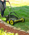 Manual Push Reel Lawn Mower With 20-Inch Cutting Width, 9-Position Height Adjustment, 8.5-Gallon Grass Catcher, Lightweight Eco Friendly Yard Care Machine For Quiet, Gas-Free Mowing And Easy Lawn Maintenance. In use on a lawn
