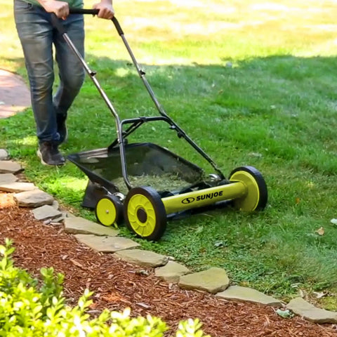 Manual Push Reel Lawn Mower With 20-Inch Cutting Width, 9-Position Height Adjustment, 8.5-Gallon Grass Catcher, Lightweight Eco Friendly Yard Care Machine For Quiet, Gas-Free Mowing And Easy Lawn Maintenance. In use on a lawn