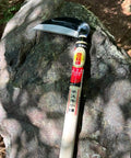 Japanese Weeding Sickle Kama For Fast Garden Cleanup, 4.7 Inch Serrated Blade, Curved Pull Cut Design on rock