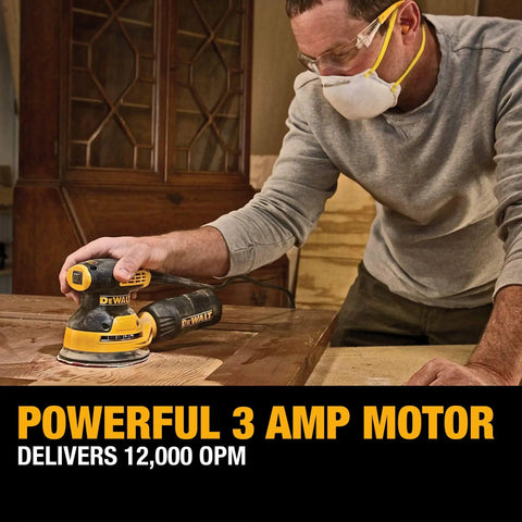 Person using 5 Inch Orbital Sander With 3.0 Amp Motor Delivers 12,000 OPM on wooden cabinet, close to the workpiece, low vibration.