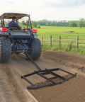 Tow Behind Drag Harrow 74 Inch Wide Driveway Grader Built Tough From Q235 Steel in use with UTV on a country road