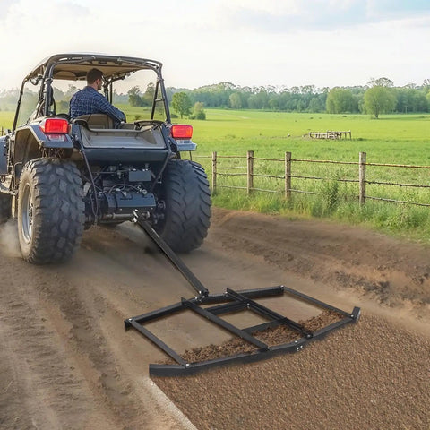 Tow Behind Drag Harrow 74 Inch Wide Driveway Grader Built Tough From Q235 Steel in use with UTV on a country road