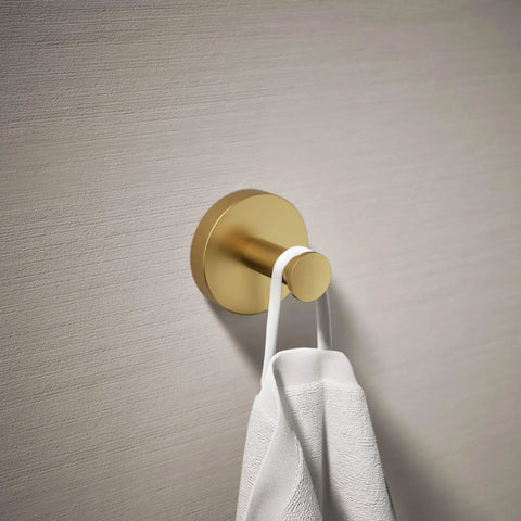 Elate Robe Hook In Vibrant Brushed Moderne Brass on wall with hanging towel, durable metal bathroom hardware
