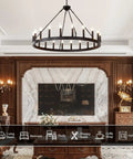 Black Wagon Wheel Chandelier 40 Inch With 20 Lights installed in elegant living room setting.