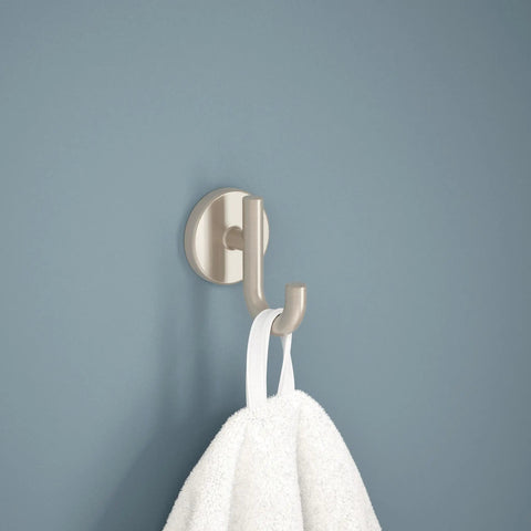Single Towel Hook In Brilliance Stainless Finish For Bathroom Or Kitchen with towel hanging against blue wall