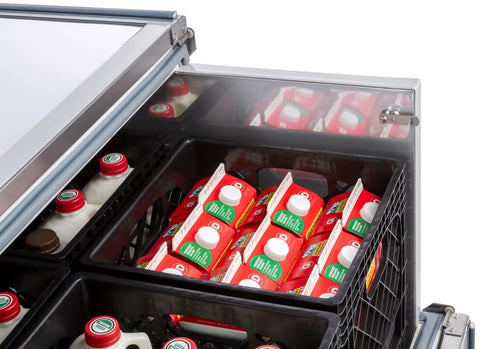 Inside view of Built Tough Stainless Steel Milk Crate Cooler Box With Heavy Duty Urethane Walls displaying dairy cartons.