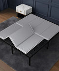Heavy Duty Bunkie Board Queen Size 60 X 80 Inches Anti Slip Sturdy Wood Platform Mattress Foundation placed on a metal frame.