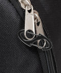 Close-up of black heavy-duty carabiner clip on backpack zipper, part of 20 Pack Heavy Duty Zipper Clips Anti Theft Carabiner Clips For Backpacks Luggage And Purses With Double Sided Spring Lock Keychain Snap Hooks In Zinc Alloy Construction Go To Gear