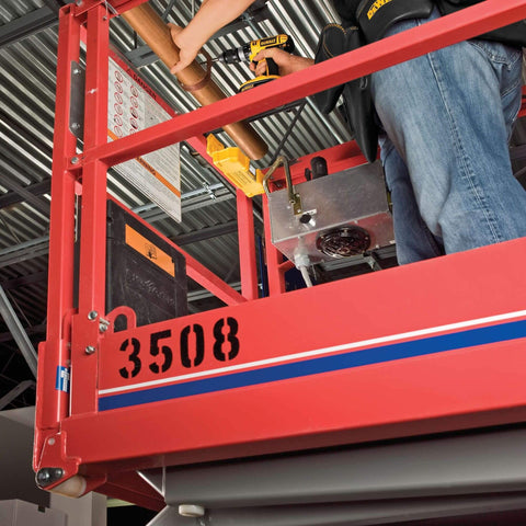 Worker using Impact Driver Bit Set With Magnetic Tough Case, 15-Piece Carbide Tipped Bits on elevated platform