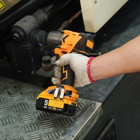 Person using Beast Torque 500 Foot Pounds 20V Cordless Half Inch Brushless Impact Wrench With 4 Speed Settings on machinery