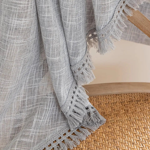 Close-up of gray tassel linen textured swag valances for farmhouse kitchen and small windows light filtering rustic topper