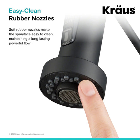 Close-up of matte black dual function kitchen faucet sprayer with easy clean rubber nozzles, spray and stream rocker switch visible.