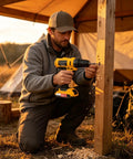 Heavy Duty Cordless Drill Kicking Serious Torque For Woodworking And Diy Projects Quick Change Chuck used by a man drilling into wood.
